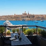 Laptop, seafront café